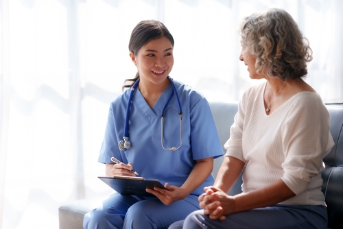 Healthcare provider talking with patient