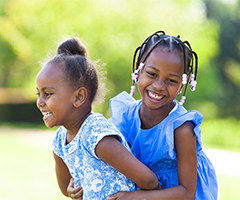 Two little girls hugging