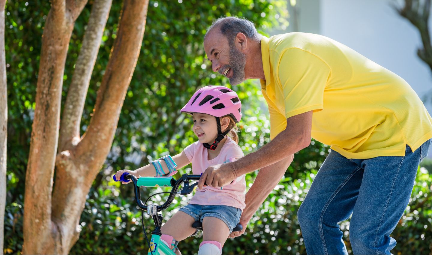 Grandpa and Child on Bike.
