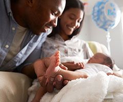Newborn baby with parents