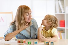 Mother and son playing blocks