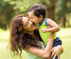 Woman holding toddler