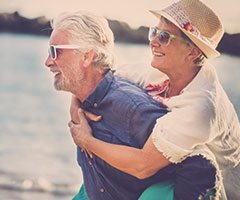 older couple piggybacking