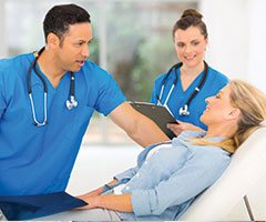 Rehabillitation team with patient
