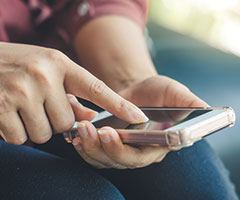 Person browsing on smartphone