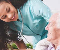 Nurse with older patient