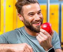 Man eating an apple