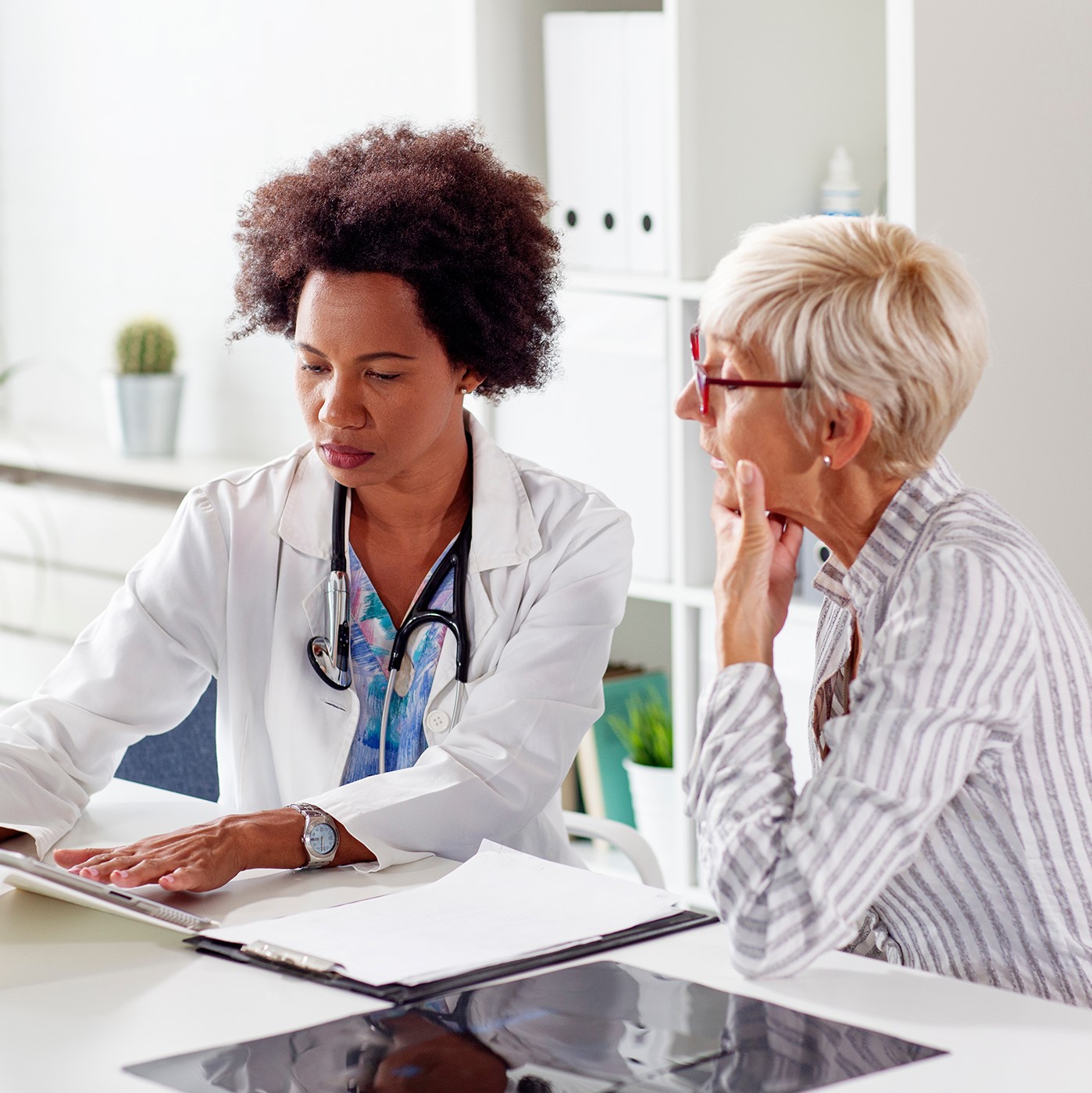 Physician and patient discussing care