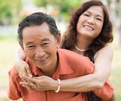 older couple piggybacking