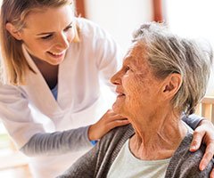 Nurse with elderly patient