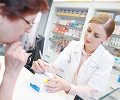Pharmacist going over perscription